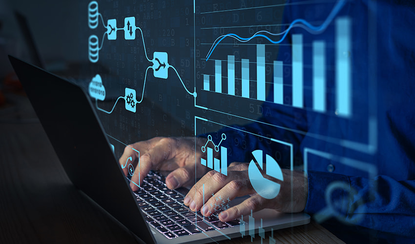photo of computer screen with animated charts and graphs