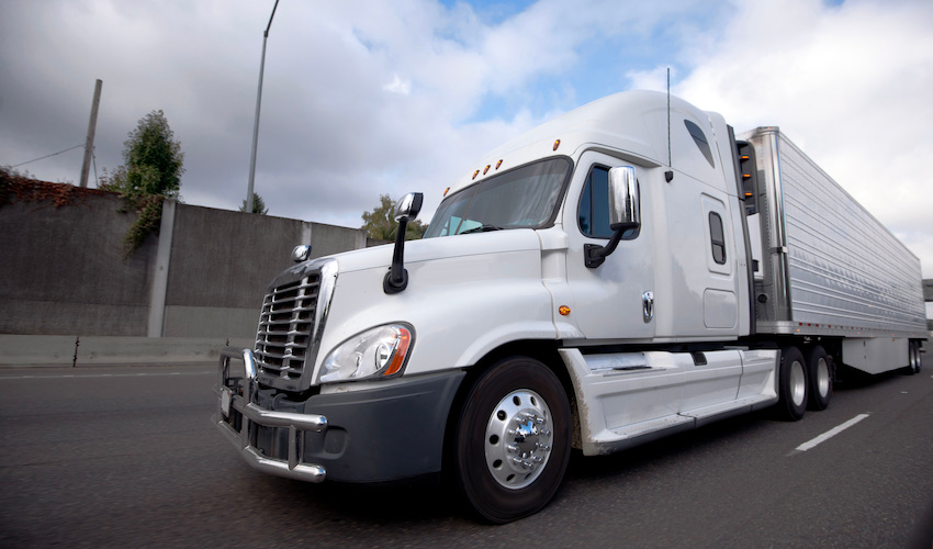 semi truck driving on the highway